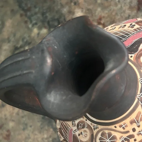 Handcrafted Ceramic Pitcher with Intricate Design - Picture 10 of 10